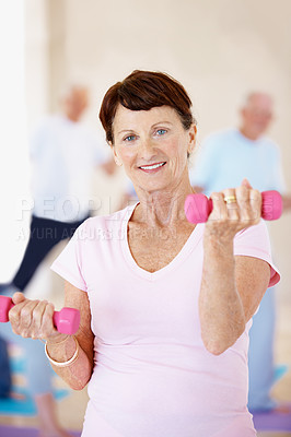 Buy stock photo Fitness, portrait or old woman in gym with dumbbells, arm workout or mobility in wellness class. Smile, active or senior person with equipment, muscle strength or weightlifting in retirement session.