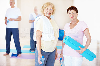 Buy stock photo Wellness, old women and portrait in pilates class to start exercise, retirement fitness and smile. Mat, water and senior people with group in studio for holistic practice, pensioner health and ready