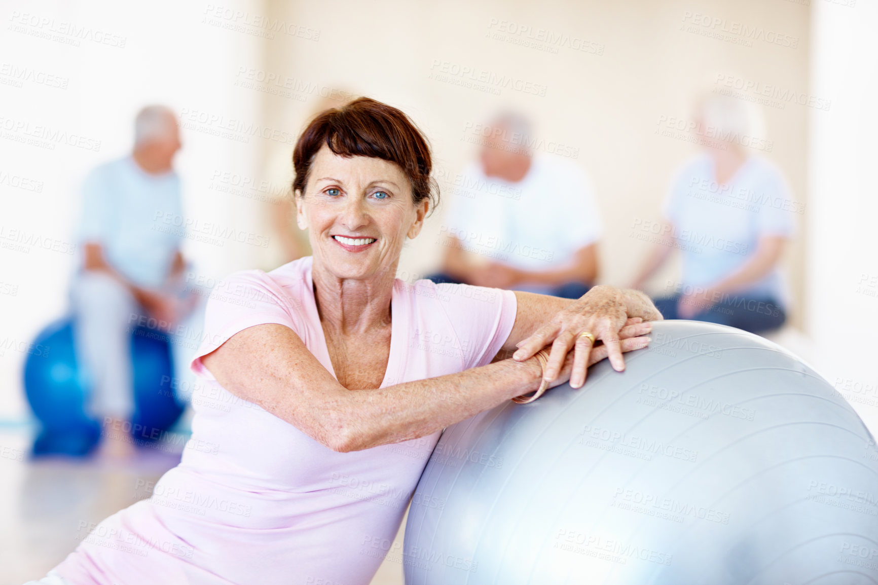 Buy stock photo Elderly woman, portrait and swiss ball in gym for flexibility, core exercise or wellness. Senior person, smile and group in health club with pilates, mobility workout or fitness for retirement