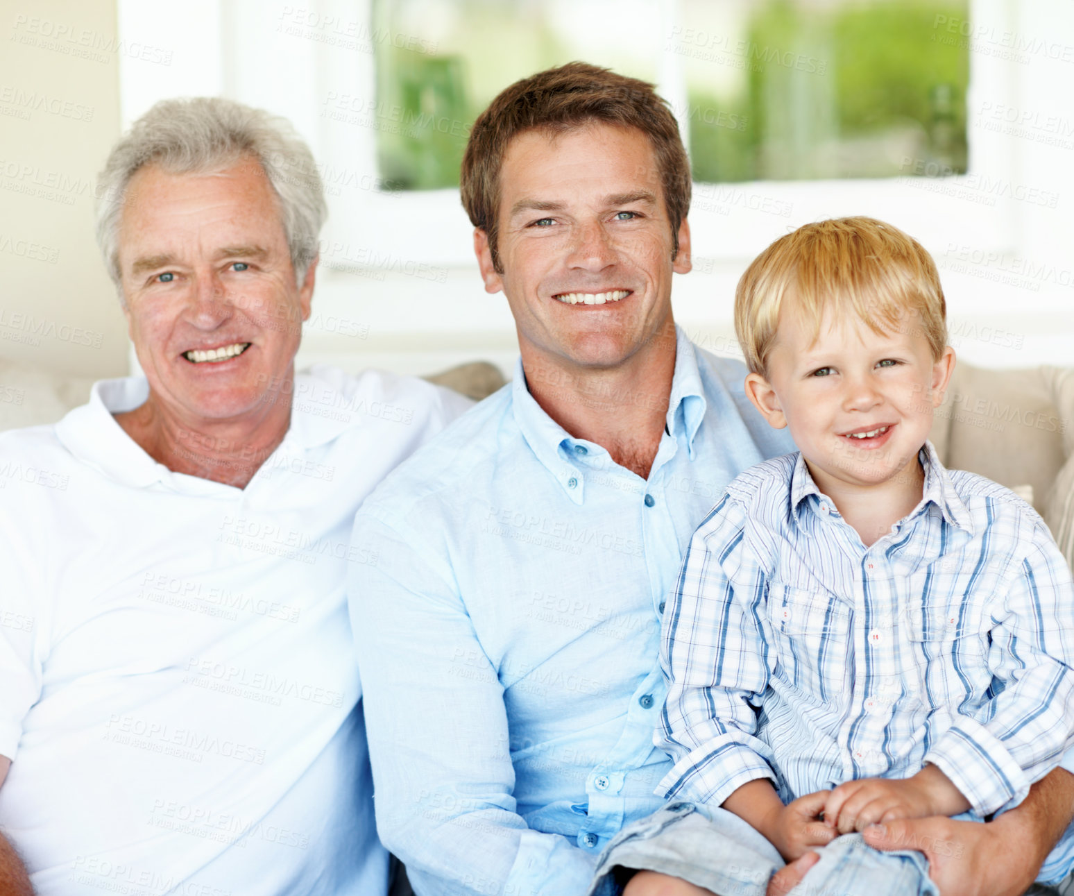 Buy stock photo Portrait, family and child in home with smile, love and bonding together with affection. Happy, father and grandfather embrace in lounge with kid, connection and visit for generations relationship