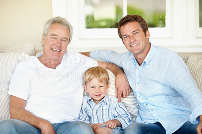 Buy stock photo Grandpa, dad and happy child on sofa for portrait, bonding and relax together on weekend. Generations, family and boy with senior man, father and smile for relationship, connection and laugh in home