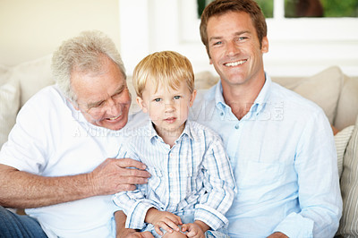 Buy stock photo Happy, dad and grandpa with child in lounge, bonding and connection with grandchild on couch in home. Family, generations and people with smile for kid, portrait and fathers day celebration in house