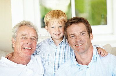 Buy stock photo Family, relax and child in home with smile, love and bonding together with affection. Portrait, father or grandfather embrace in living room with kid, connection and generations relationship at house