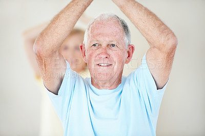 Buy stock photo Fitness, stretching and thinking with old man in pilates studio for activity, health or wellness. Exercise, reaching and vision with senior person in gym class for flexibility, mobility or training