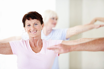Buy stock photo Stretching, portrait and old woman in yoga class for wellness, happy and balance in retirement home. Senior resident, smile and warrior pose in health club for mobility exercise, fitness and cardio