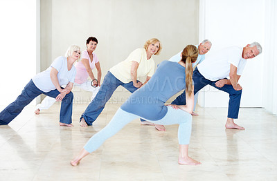 Buy stock photo Back, coach and stretching with people for yoga, fitness and assistance for holistic balance. Smile, instructor and senior group with warm up for wellness, yogi demonstration and mobility flexibility