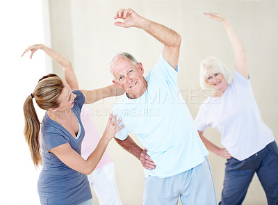 Buy stock photo Help, stretching and old man with trainer at fitness class, physical therapy and wellness. Portrait, instructor and happy people at studio with arm exercise, support and side bend in retirement