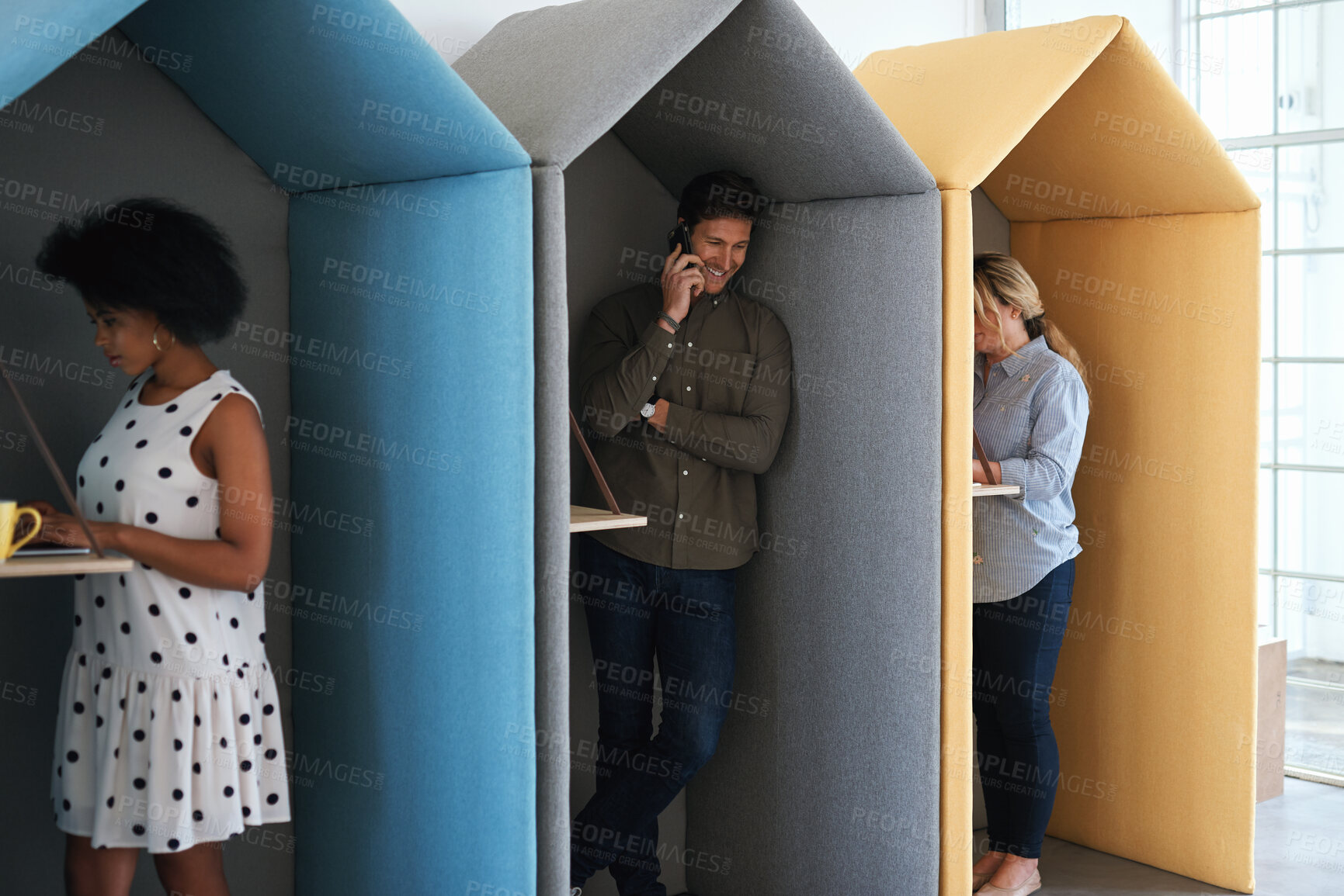 Buy stock photo People, business and booth with technology for workspace isolation, privacy or hybrid work. Group, employees or colleagues with laptop or smartphone in worker cubicle for seclusion or distance