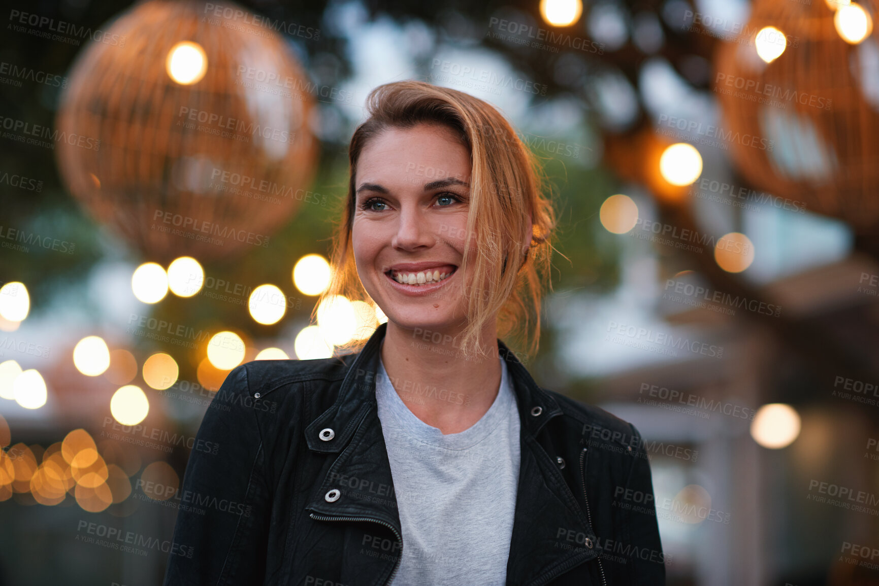 Buy stock photo Night, thinking and happy woman in city with travel, lights and vision for weekend break outdoor. Bokeh, female person and explore downtown with wellness, good mood and reflection for calm evening.