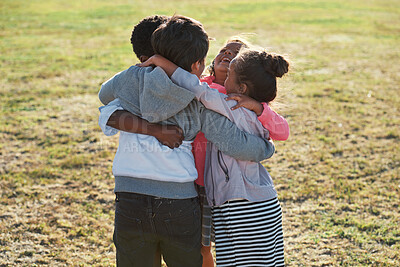 Buy stock photo Laughing, friends and children with hug in park, weekend bonding and playing together for connection. Support, embrace and happy kids with game for relationship development, space and grass field
