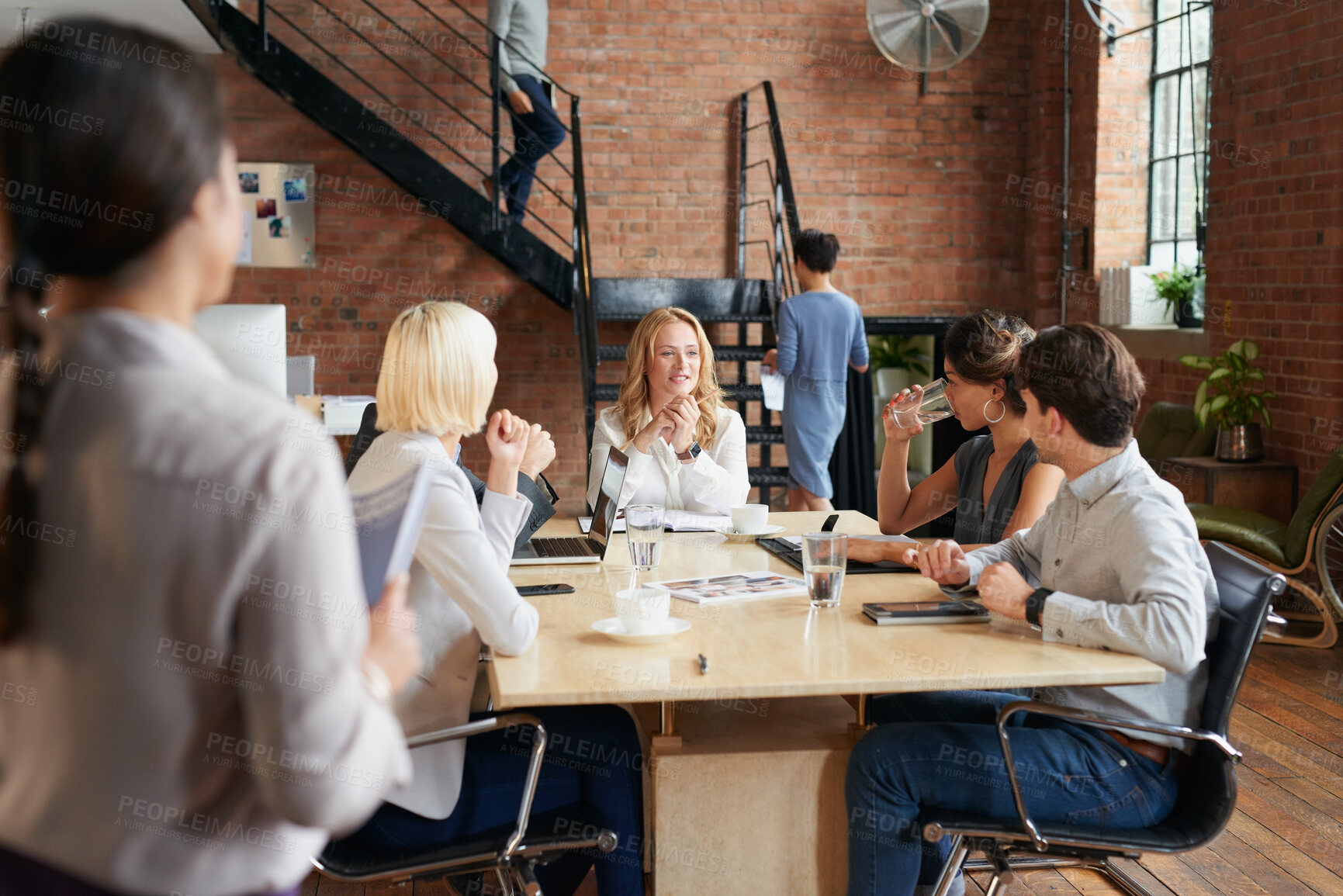 Buy stock photo Meeting, team and discussion in office with happy woman, marketing budget and problem solving. People, planning and listening with manager for advertising campaign, collaboration and strategy brief