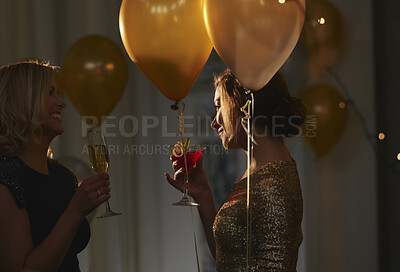 Buy stock photo Night, friends and women with alcohol at event, birthday celebration and gossip at social gathering. Evening party, talking and happy people with drinks for get together, bonding and weekend reunion