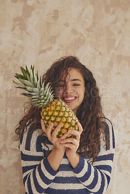 Buy stock photo Pineapple, portrait and smile of woman in studio for health, organic diet or wellness food. Fruit, nutrition and vitamins with happy person on wall background with benefits of healthy eating