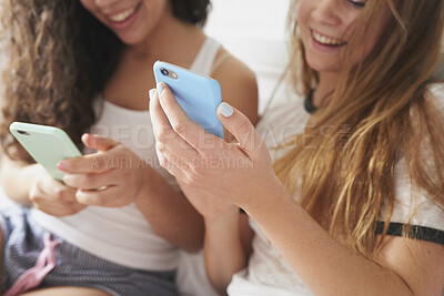 Buy stock photo Friends, hands and relax in home with phone, social media or smile for bonding together on weekend. Happy, women and tech in house with browse website, blog or watching video for online entertainment