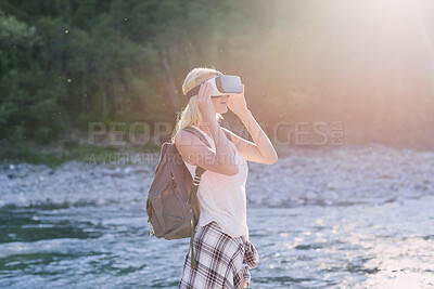 Buy stock photo Forest, woman or travel with vr headset in nature for outdoor fantasy, sightseeing or adventure. Female person, tourist or simulation with augmented reality goggles, lake or river for explore or trip