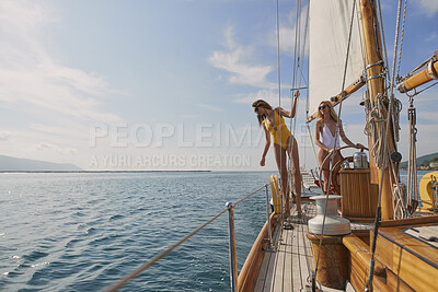 Buy stock photo Peace, travel and sea with friends on yacht for summer vacation, holiday and seaside adventure. Relax, sailing and tropical cruise with women on boat for ocean expedition, space and journey together