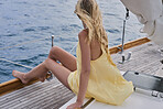 Beautiful woman on sailboat in ocean on luxury lifestyle happy adventure travel vacation