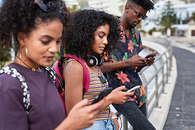 Buy stock photo People, online and friends with phone in city, network or communication with contact on social media. Typing, message and group with mobile for chat, connection and texting with technology on street