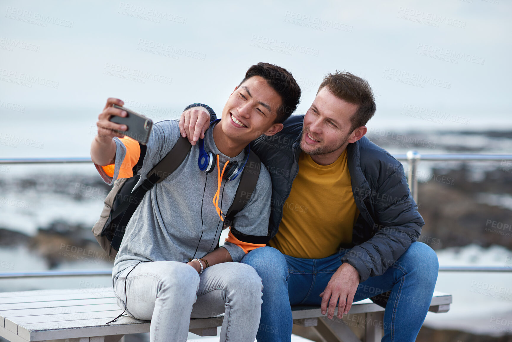 Buy stock photo Selfie, smile or college students outdoor with fun, bonding together or friendship post on academic break. Happy, connection or men with embrace, university trip or memory capture for social media.