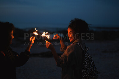 Buy stock photo Party, friends and women with sparkler outdoor for celebration, social gathering and laugh together. Funny people, fireworks and hang out in nature for new year, festive season or excited at night