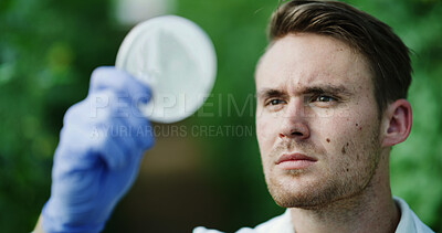 Buy stock photo Man, scientist or petri dish outdoor with plant, research or botany study for medical cure. Science, botanist or analysis of leaves sample for agriculture, microbiology and conservation with specimen