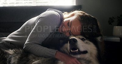 Buy stock photo Cuddle, husky and love with woman in home living room for affection, bonding or security. Animal care, hugging and smile of happy dog owner on sofa in apartment for companionship, loyalty or trust