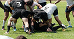 Rugby, exercise and tackle with men on field for game, match and preparation or competition. Sports, training and teamwork with group of athletes outdoor for club practice, tournament or fitness