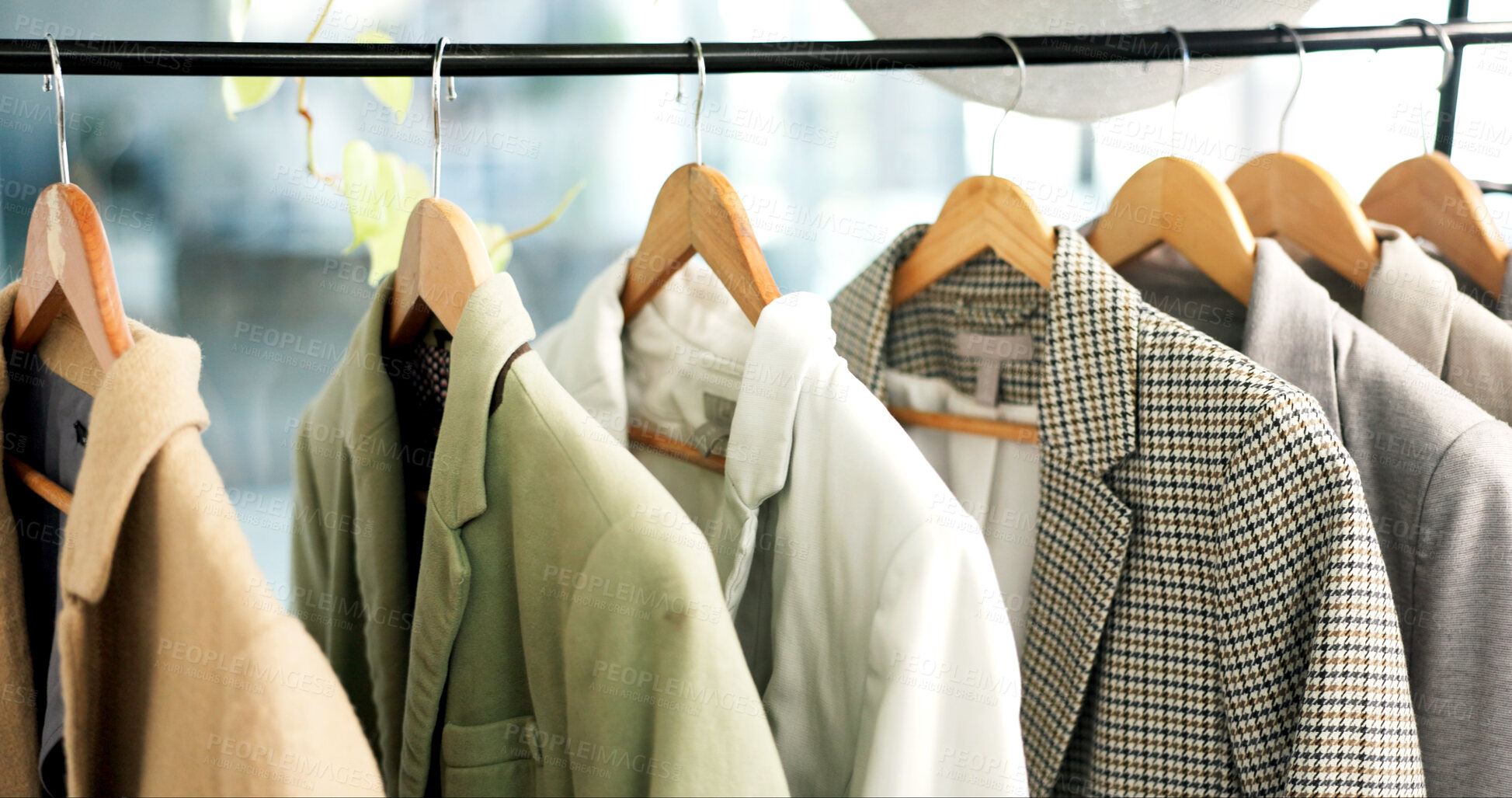 Buy stock photo Rail, hanger and jacket in store with choice, decision and shopping for retail therapy with fabric quality. Fashion, design and blazer on rack in boutique with discount, deal or sale in mall.