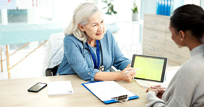 Buy stock photo Tablet screen, consultation and doctor with woman in hospital for medical diagnosis or treatment plan. Space, digital technology and mature healthcare worker with female patient for checkup in clinic