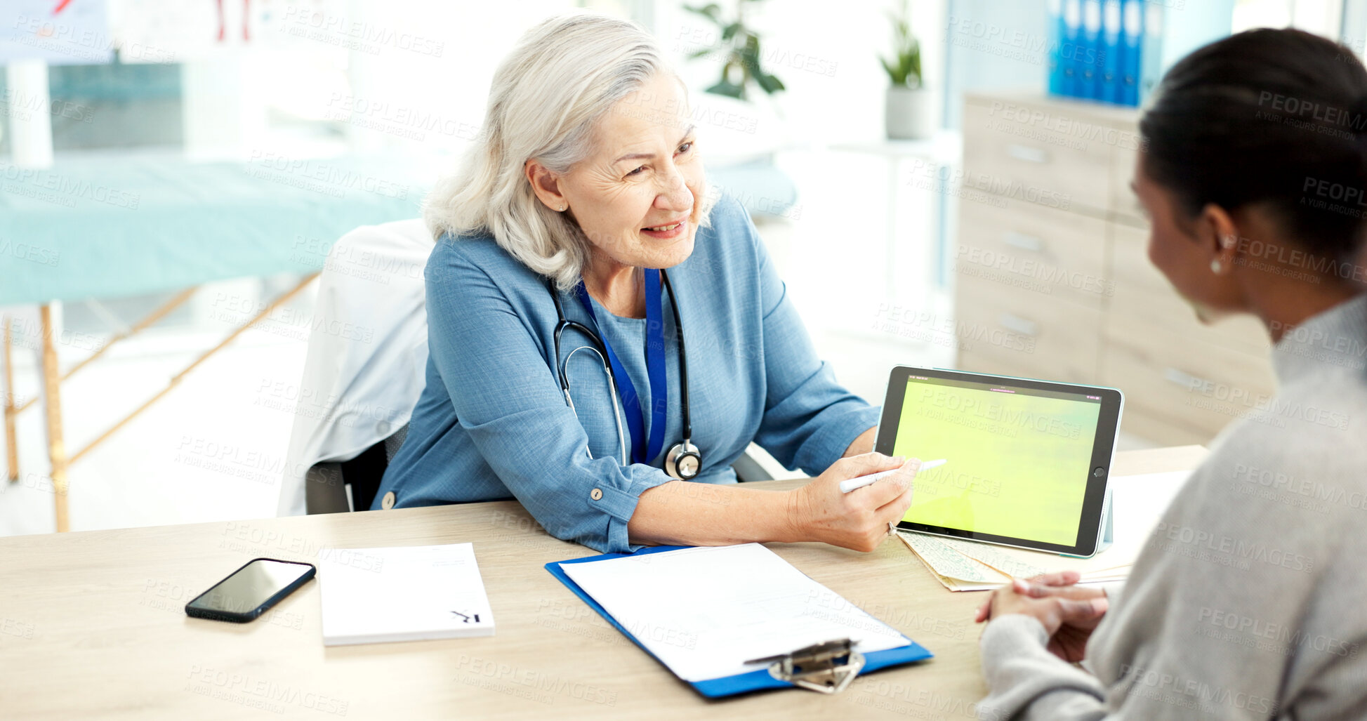 Buy stock photo Tablet screen, consultation and doctor with woman in hospital for medical diagnosis or treatment plan. Space, digital technology and mature healthcare worker with female patient for checkup in clinic