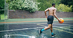 Basketball, game and man with fitness, wellness and training for progress, technique and energy. Outdoor, person and player with practice for health benefits, challenge and competition with hobby