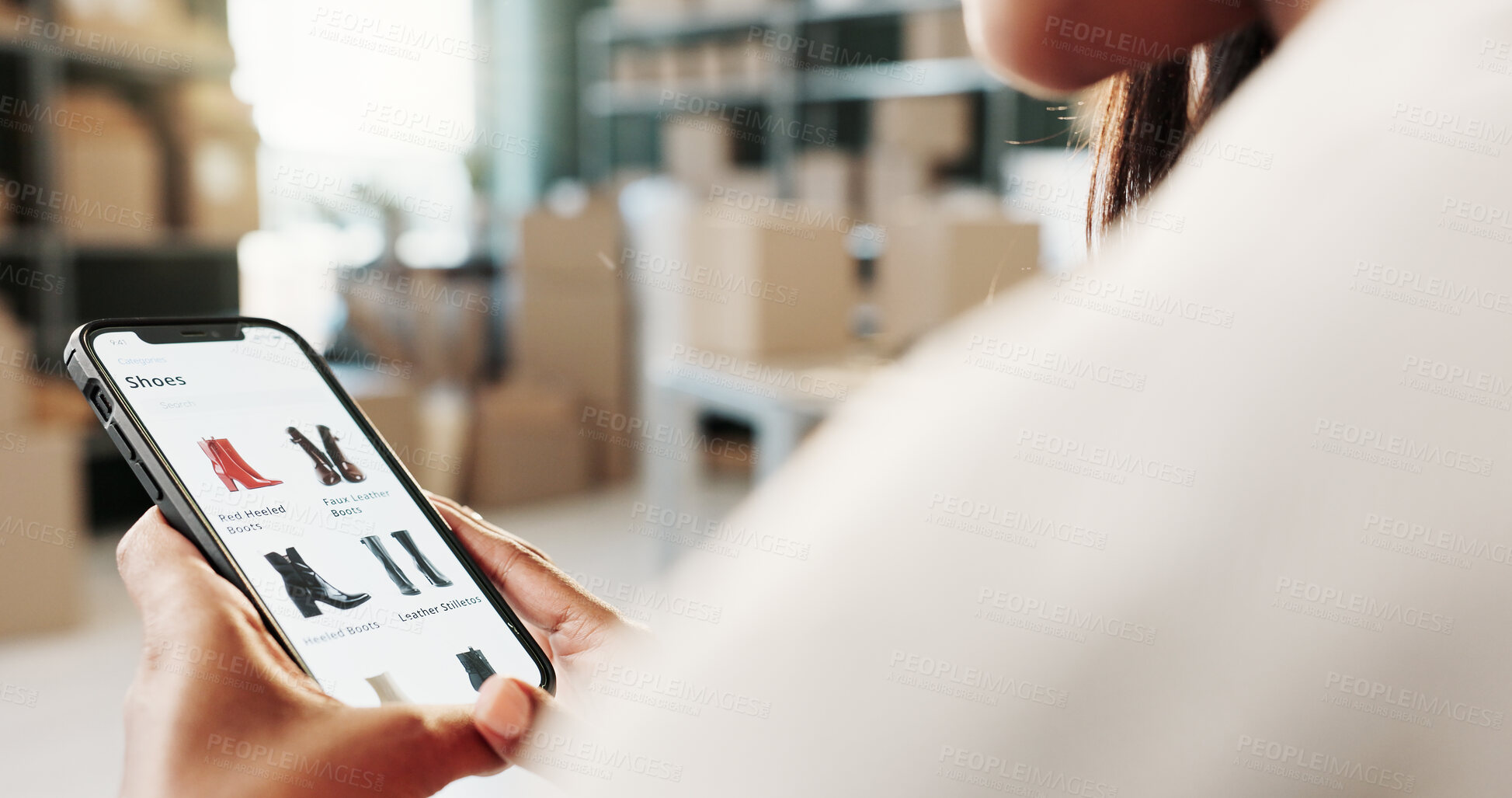 Buy stock photo Online shopping, phone screen and hands in warehouse for fashion, browse catalog or search app. Entrepreneur, person or mobile in small business for webshop service, scroll or stock to purchase shoes