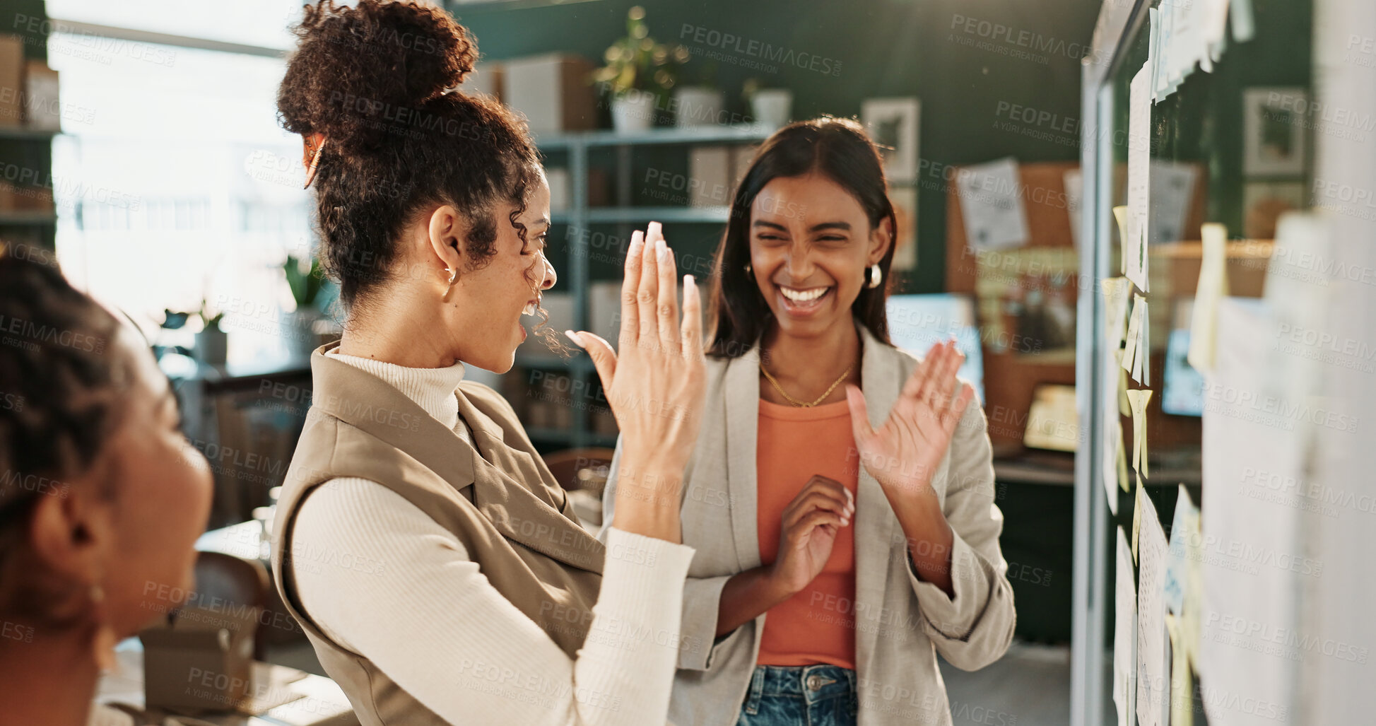 Buy stock photo High five, logistics and storyboard with women in office together for delivery or distribution goals. Collaboration, glass wall and planning with happy supply chain team in warehouse for celebration