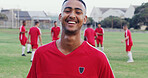 Happy, fitness and portrait of soccer player on field for game, workout or training with championship. Smile, man and athlete with confidence for football match, exercise or practice outdoor.