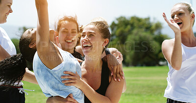 Buy stock photo Fitness, women and hug with group for win, celebration and solidarity outdoor for competition. Excited, people and athlete team together for bonding, exercise and smile for success with tournament