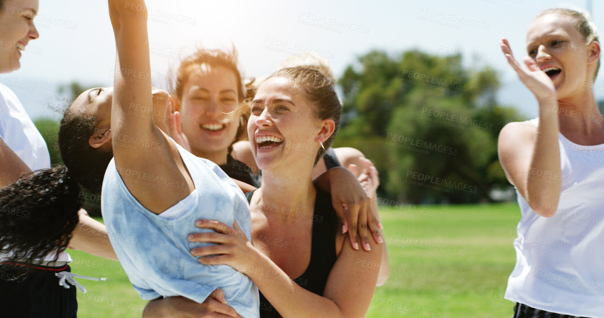 Buy stock photo Fitness, women and hug with group for win, celebration and solidarity outdoor for competition. Excited, people and athlete team together for bonding, exercise and smile for success with tournament