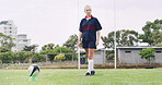 Rugby, ball and kick with woman on field for training, game challenge and sports tournament. Fitness, match practice and competition with person in stadium for championship, penalty score and athlete