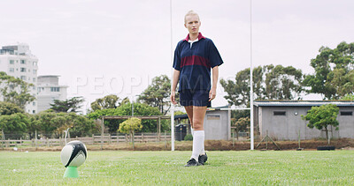 Buy stock photo Rugby, ball and kick with woman on field for training, game challenge and sports tournament. Fitness, match practice and competition with person in stadium for championship, penalty score and athlete