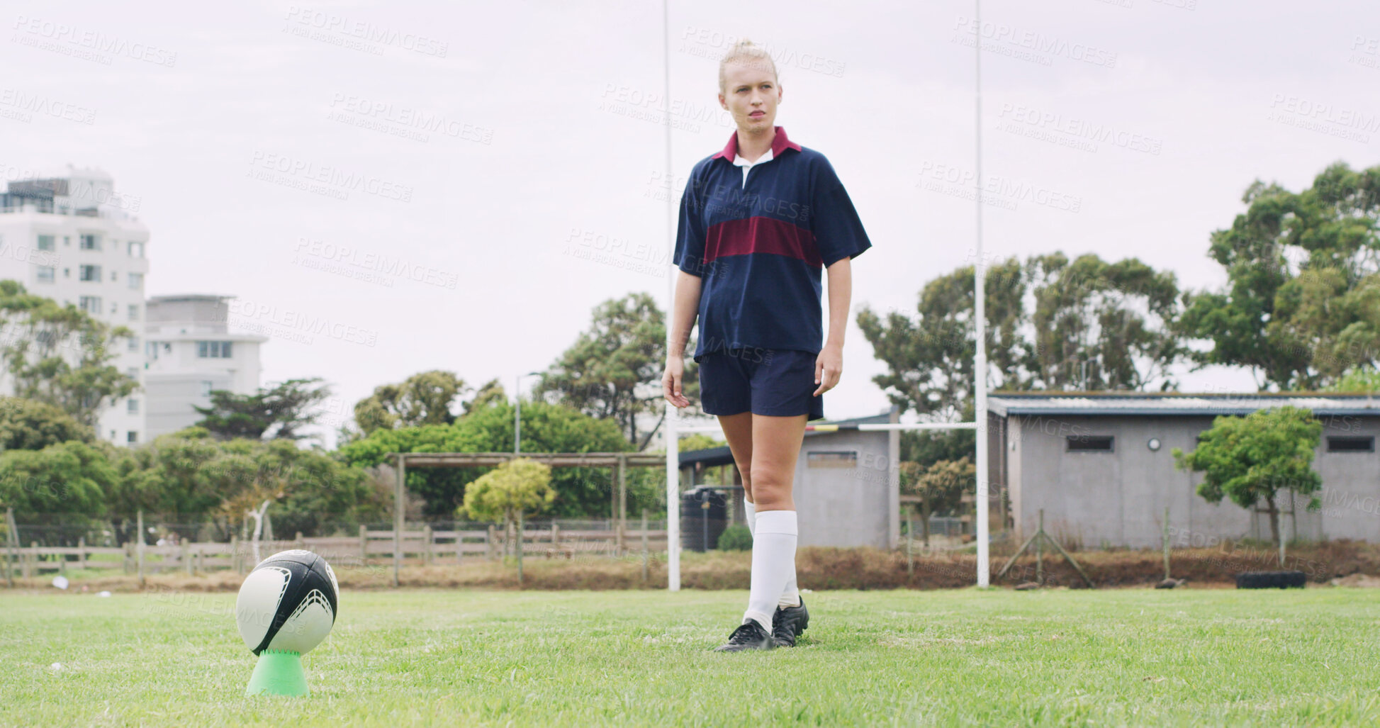 Buy stock photo Rugby, ball and kick with woman on field for training, game challenge and sports tournament. Fitness, match practice and competition with person in stadium for championship, penalty score and athlete