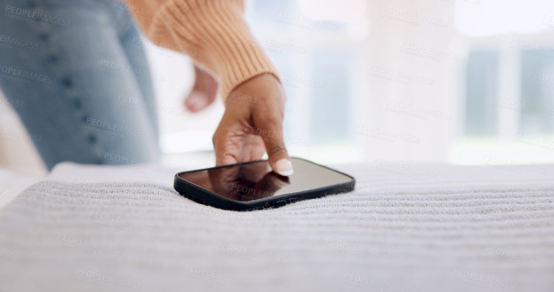 Buy stock photo Hand, phone and woman in bedroom of home for alert, app notification or communication. Answer, pick up and space with mobile on bed in apartment for connection, social media or website browsing