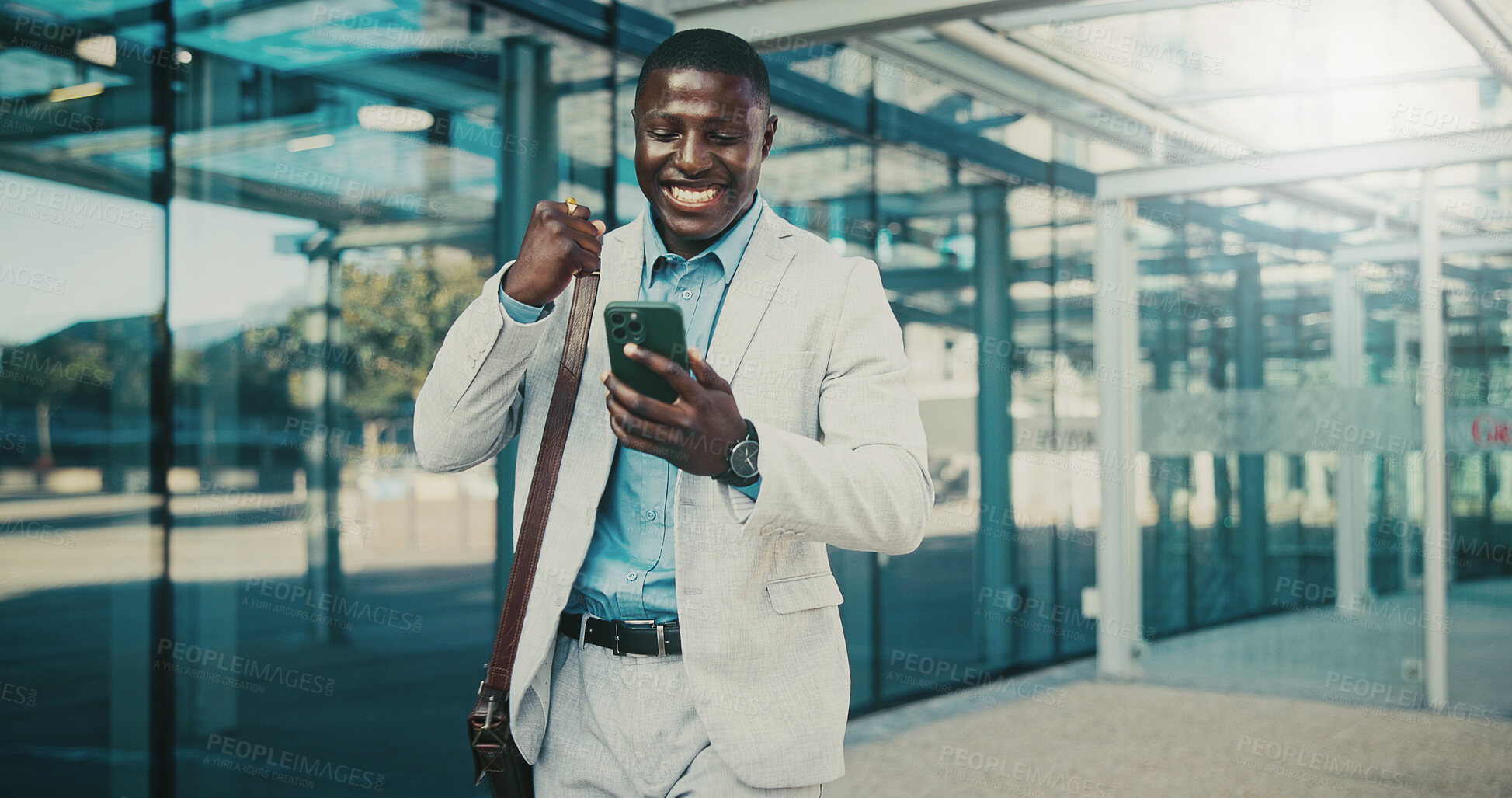 Buy stock photo Fist pump, lawyer or black man with phone in city, message notification or celebrate pass for bar exam. Urban, milestone and happy paralegal with success for career growth, mobile and check results