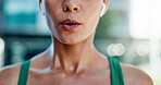 Tired, woman and breathing outdoor for fitness, exercise and exhausted from cardio training. Exhale, fatigue and female person in city with burnout, overworked and recovery from endurance challenge
