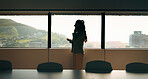 Business woman, phone call and window in office building for talking, boardroom and corporate job. Employee, technology and person with contact for communication, feedback or space for city project