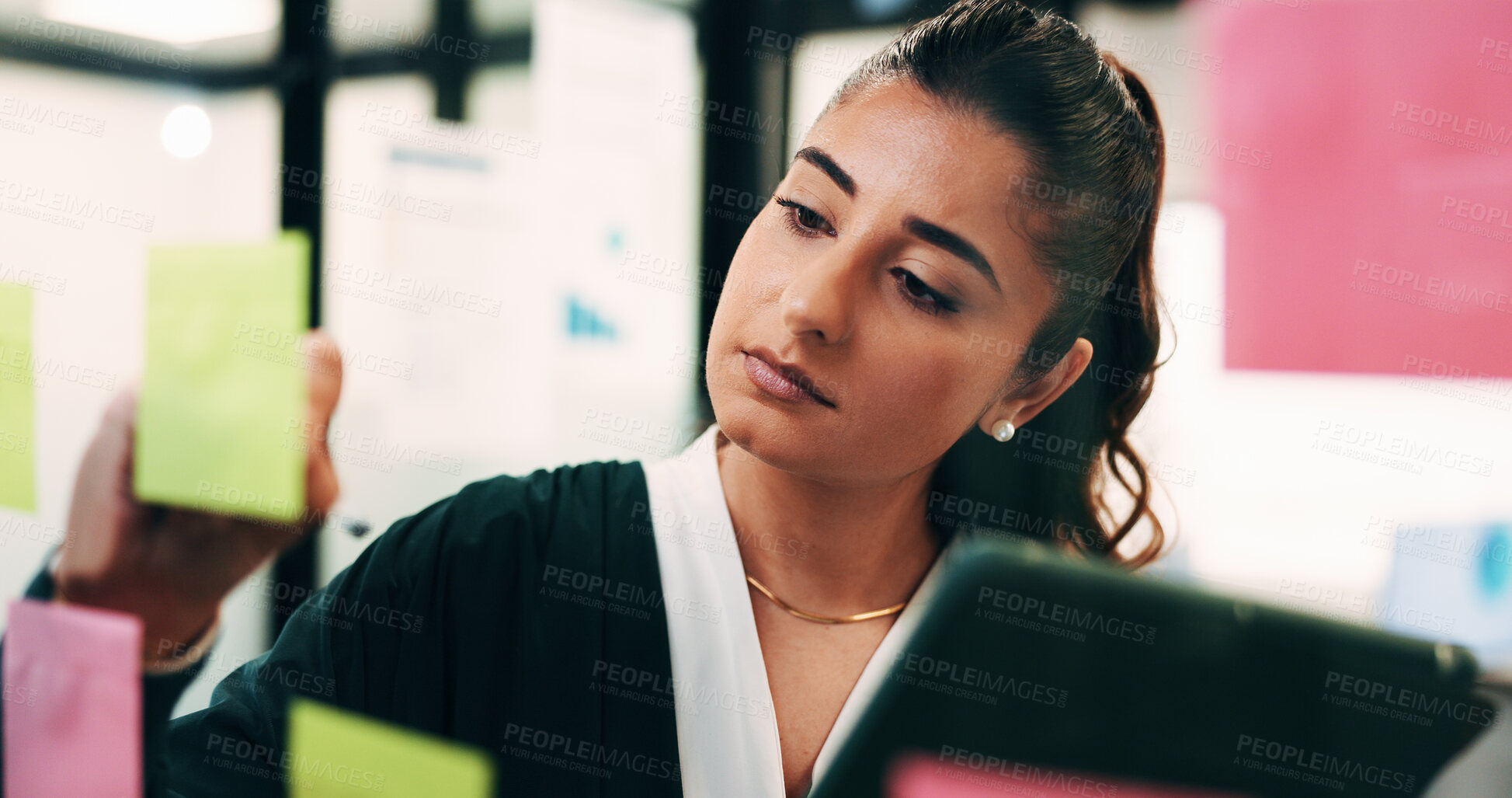 Buy stock photo Tablet, woman and writing on sticky notes in office for venue ideas, planning guest list or agenda. Event planner, tech or brainstorming on glass for vendor sourcing, schedule and project management