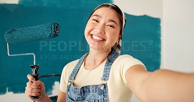 Buy stock photo Happy woman, selfie and painting wall with roller, renovation and property development at house. Asian person, interior design and remodeling in portrait, social media and post for home improvement