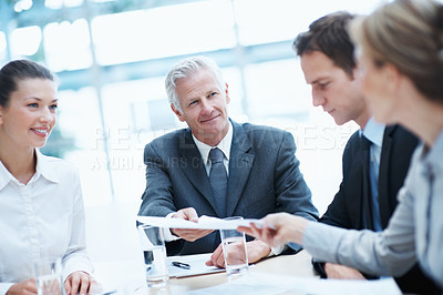 Buy stock photo Corporate, meeting and business people in office with documents, manager and handover for budget review. Accounting, management and team in firm with paperwork, collaboration and financial planning.