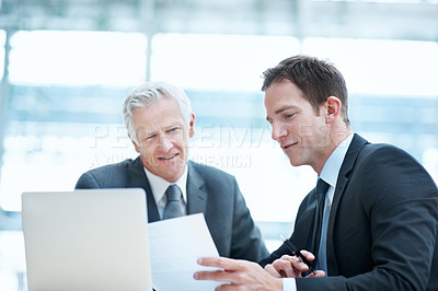Buy stock photo People, discussion and documents at law firm with laptop, manager advice and legal aid for court case. Attorney, men and conversation in office with computer, paperwork and collaboration for lawsuit.