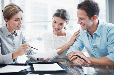 Buy stock photo Finance, happy couple and document in office with consultant, insurance update and holding hands. Paperwork, married people and broker in meeting for investment guide to qualify for premium cover
