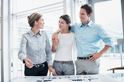Buy stock photo Architect, couple or consultation with documents, blueprint or budget planning for renovation. Happy people, paper or clients with construction layout, hug or development cost for design in office
