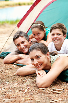 Buy stock photo Family, camping and portrait in forest for vacation with love, bonding and relax in nature together. Mother, father and children with tent in woods for holiday, summer trip and wilderness for travel